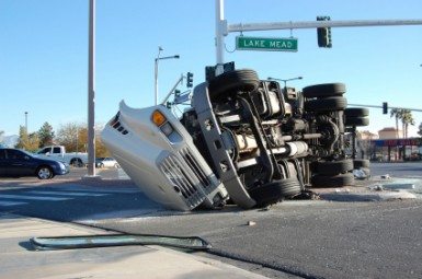 semi-truck rollover accident in the middle of an intersection
