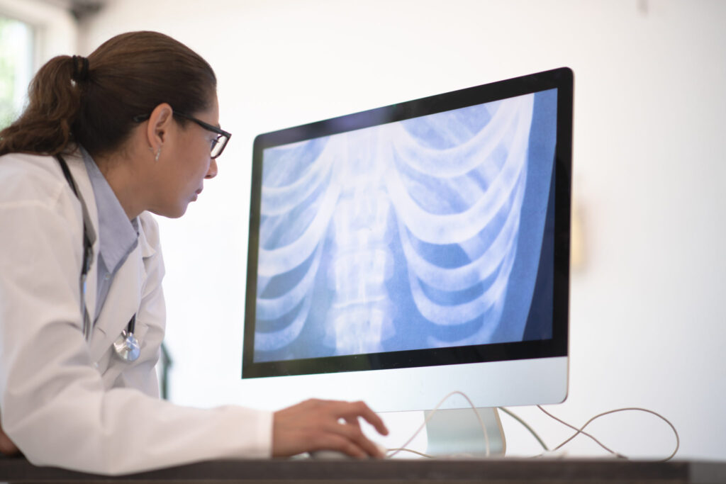 Doctor looking at Xrays