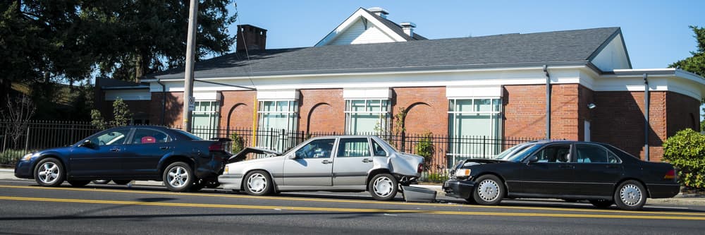 three cars involved in an accident